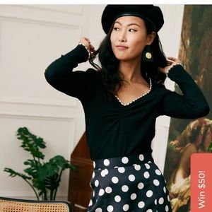 Black top with pearl details